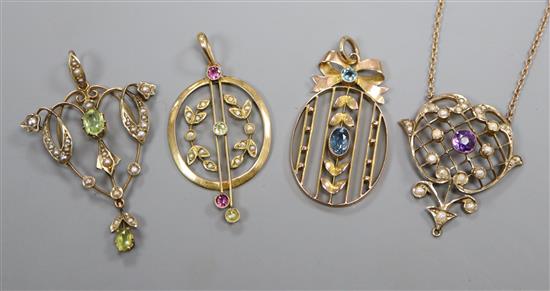 Four assorted early 20th century 9ct and gem set pendants including one with 9ct chain.